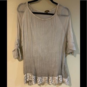Lightweight top with intricate details. Size L